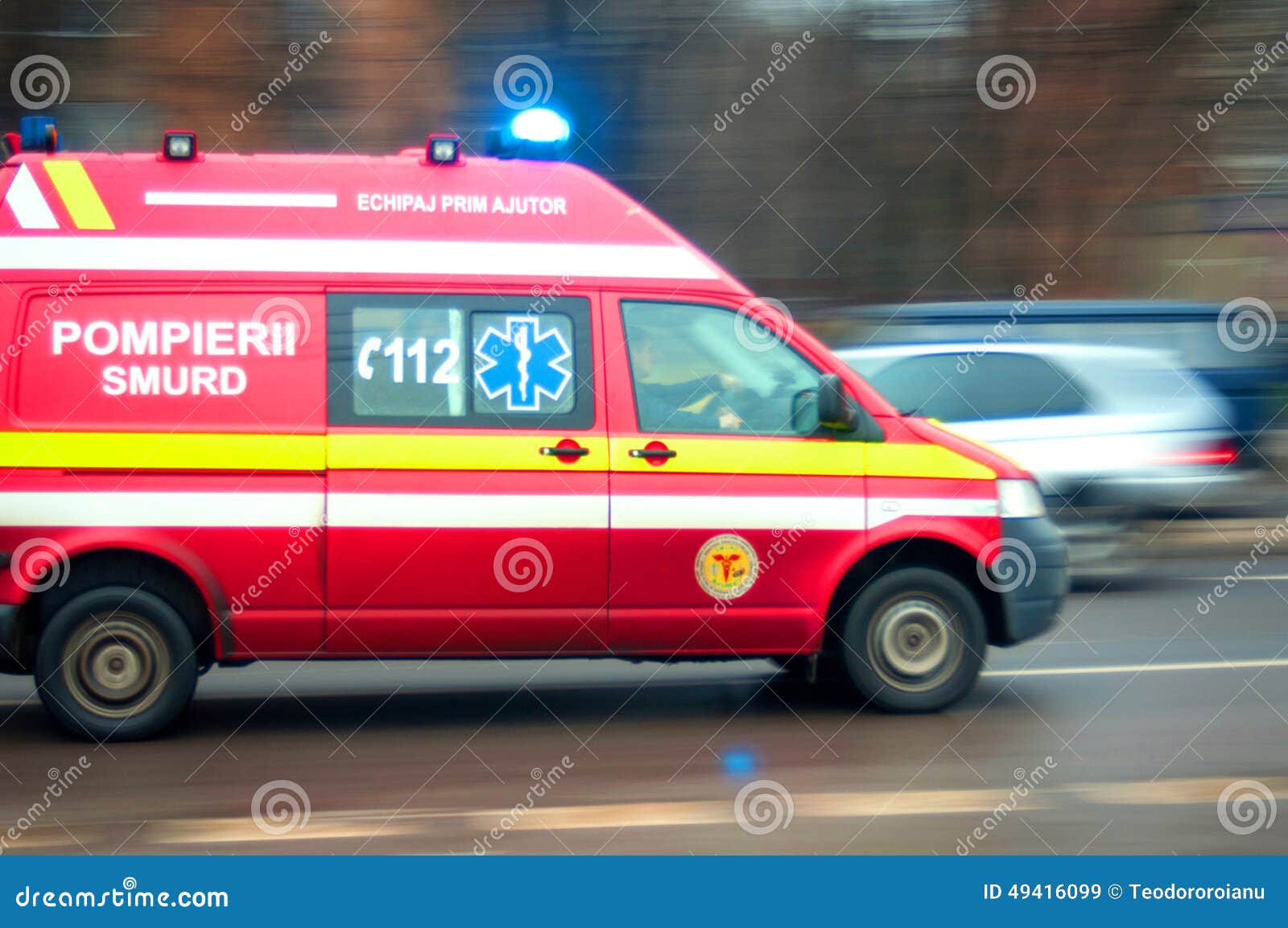 Ambulance in traffic editorial stock image. Image of lights 49416099