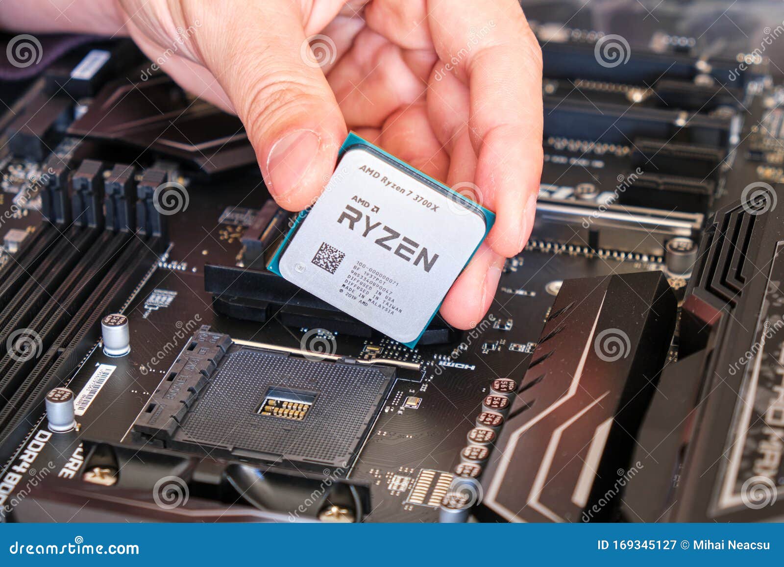 Amd Ryzen 3700x Cpu In Technician Fingers Above A Motherboard Part Of A Custom Pc Build Editorial Photography Image Of Future Fingers 169345127