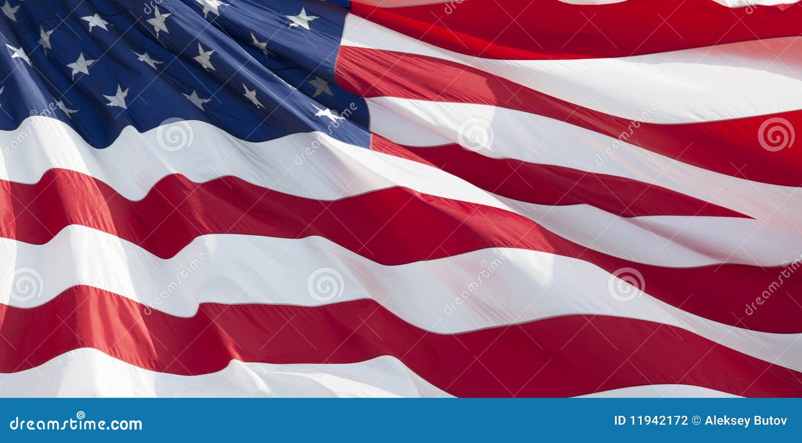 Photo of American flag waving in the wind