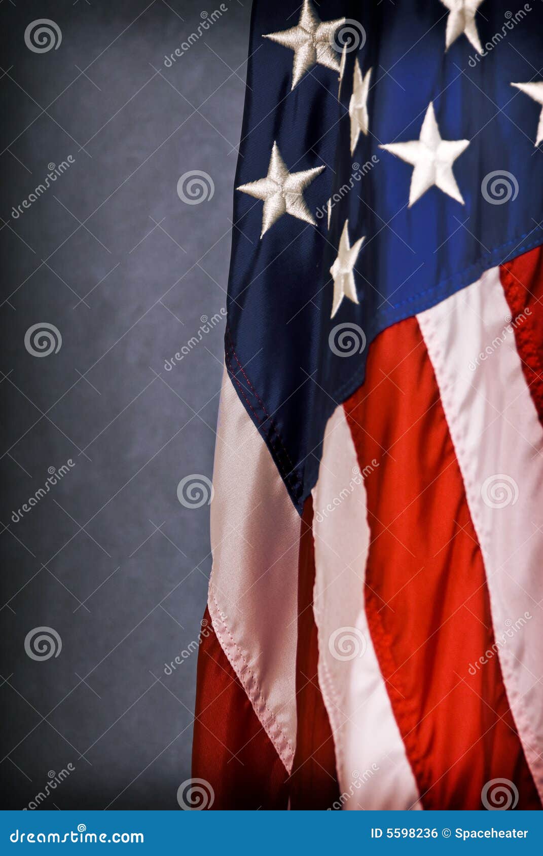 A small portion of an American Flag. Selective focus on just a few stars.