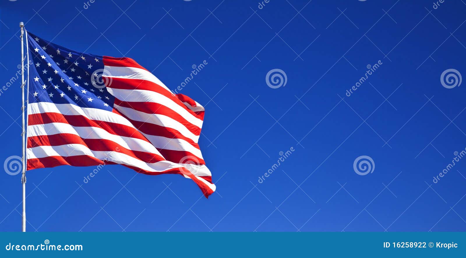 American Flag Fluttering in Blue Sky 1 Stock Photo Image of national
