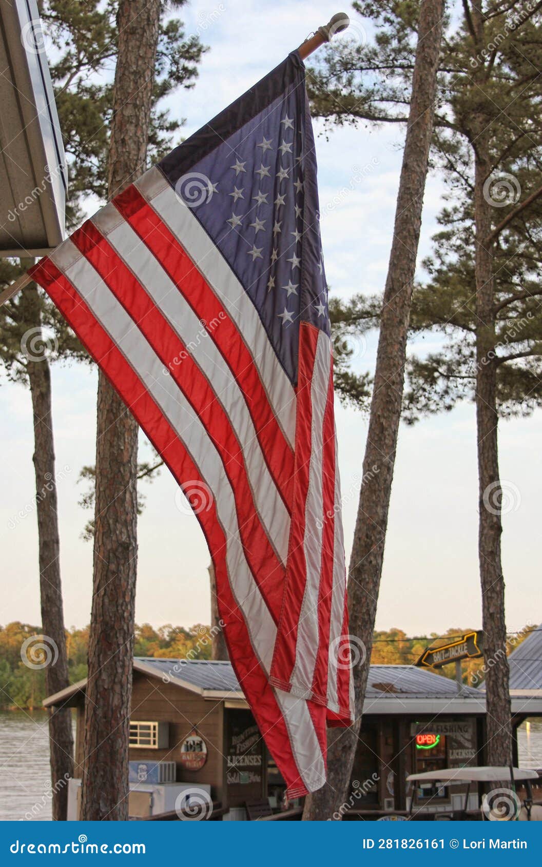 American Flag Near Bait and Tackle Shop on Lake in Rural East