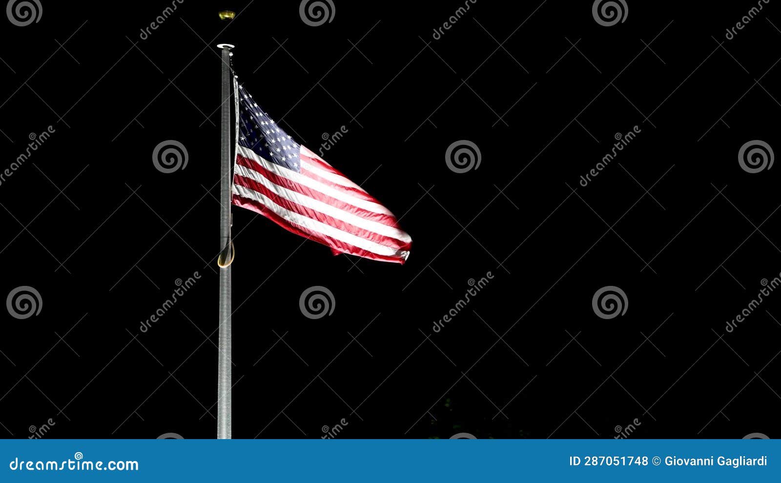 American Flag at Night Against Dark Sky Stock Footage Video of