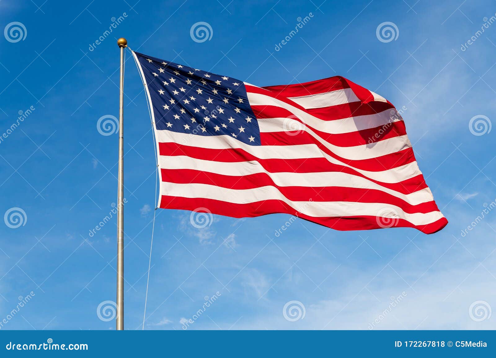 american flag waving in the wind