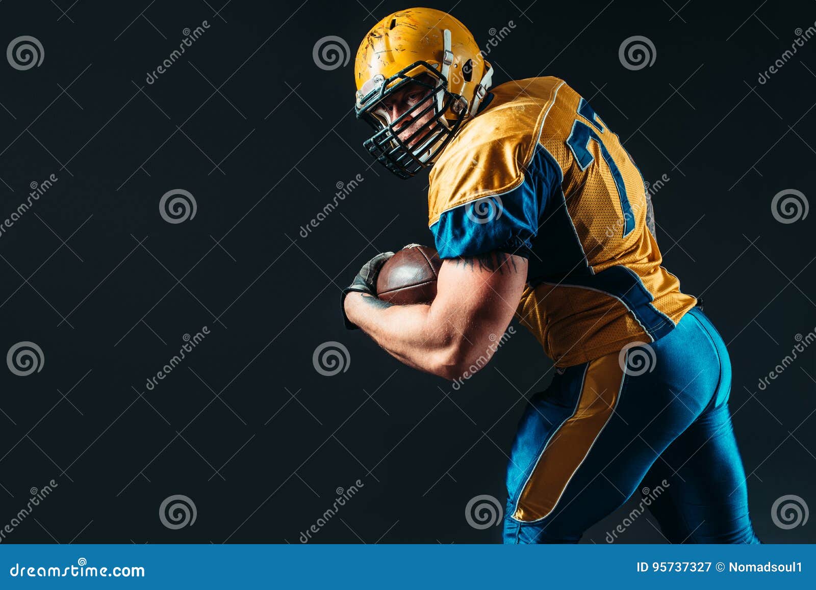 american football offensive player with ball