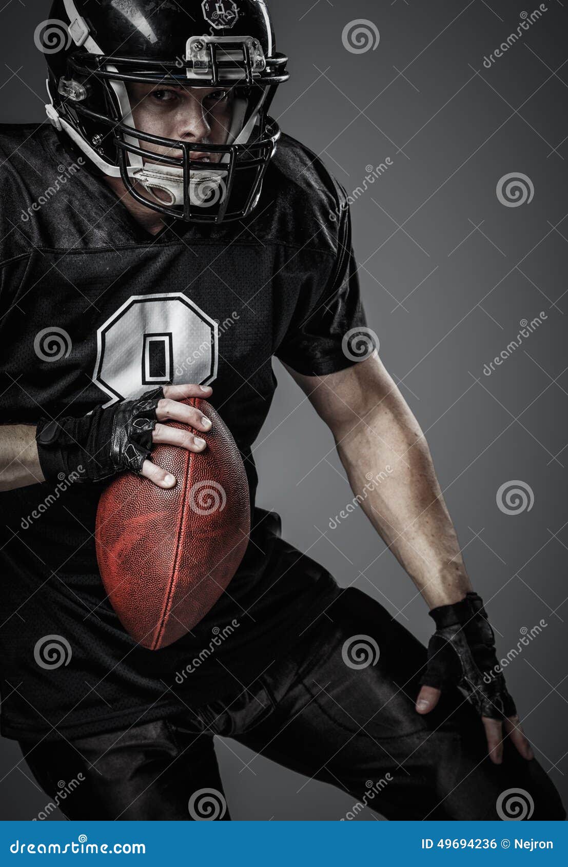 American football player stock photo. Image of defend - 49694236