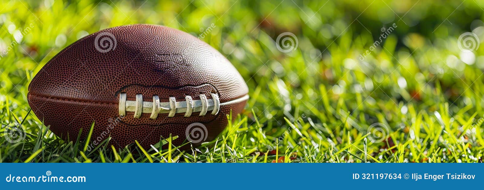 american football on stadium grass providing ample space for convenient text placement