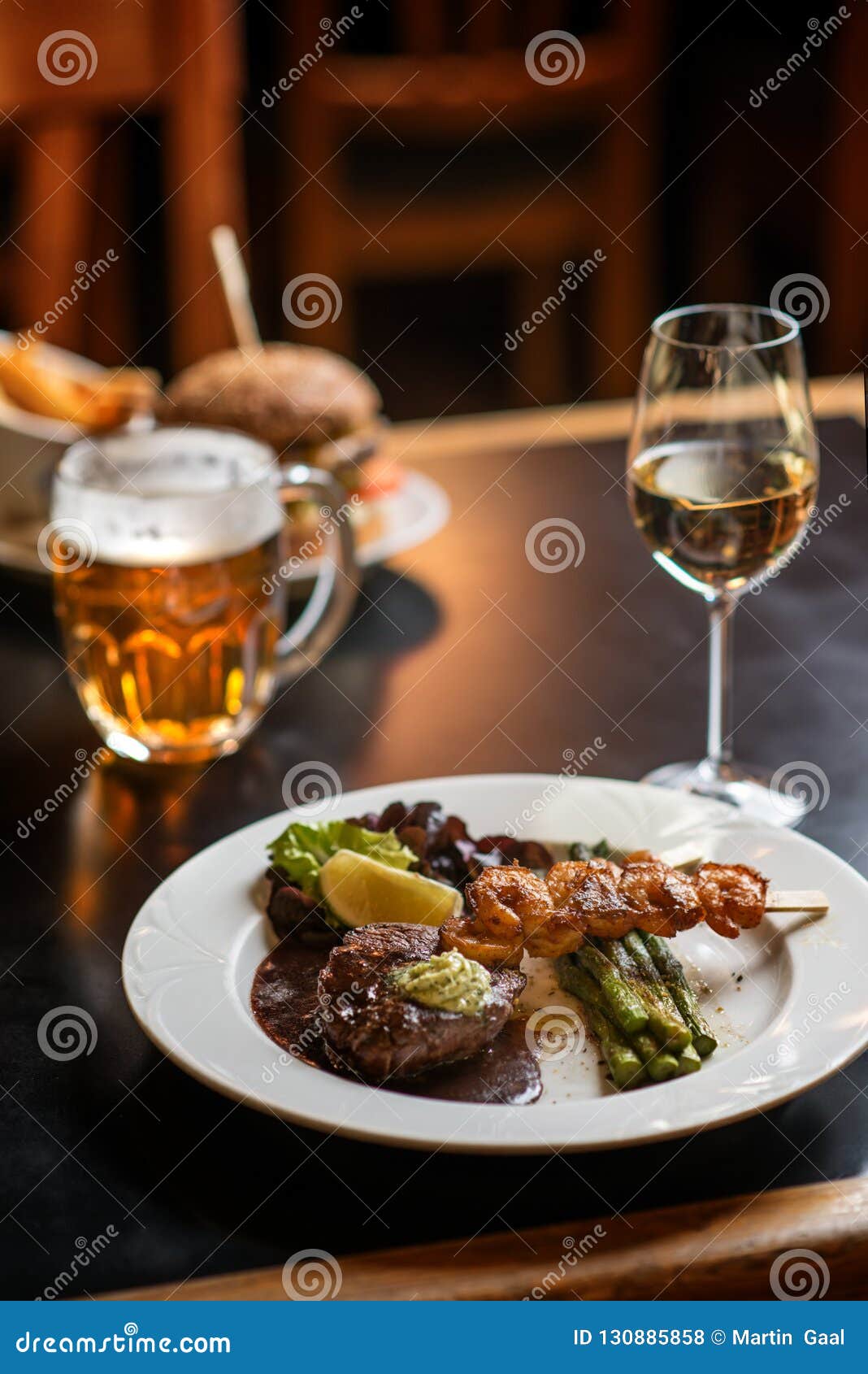 American Hamburger with Glass of Beer or Wine in Restaurant, Beer