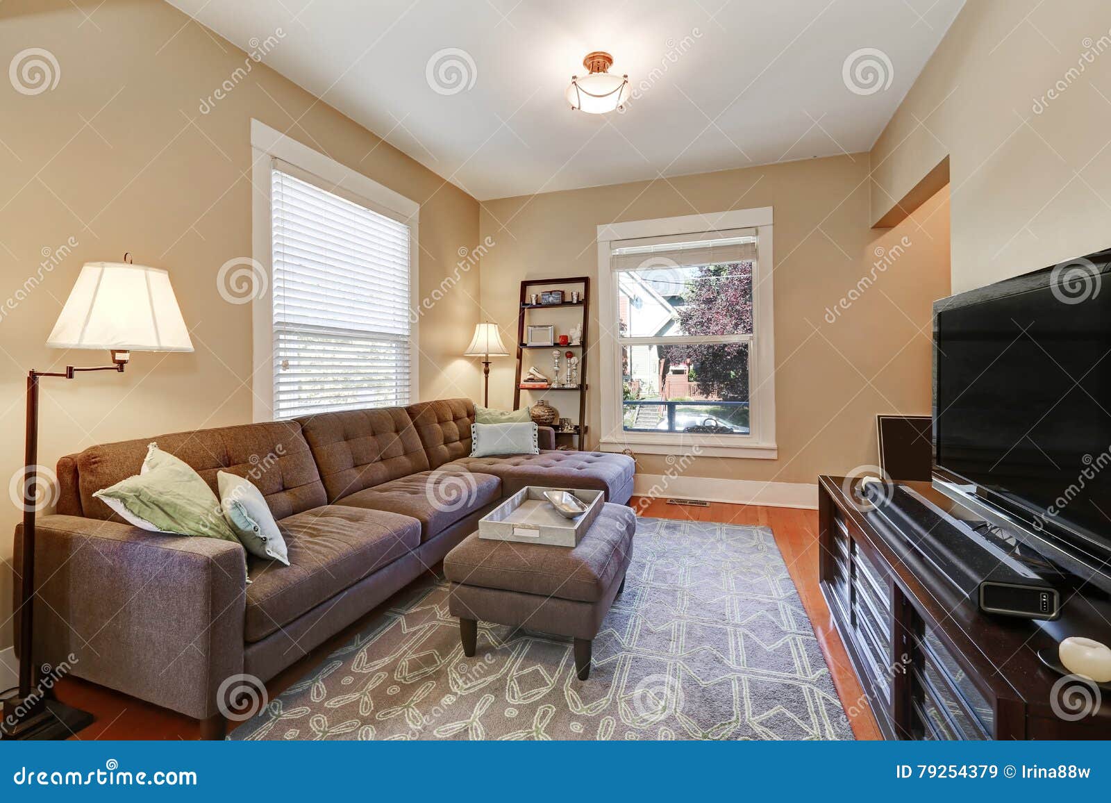 American Living Room Interior With Brown Corner Sofa Stock Photo