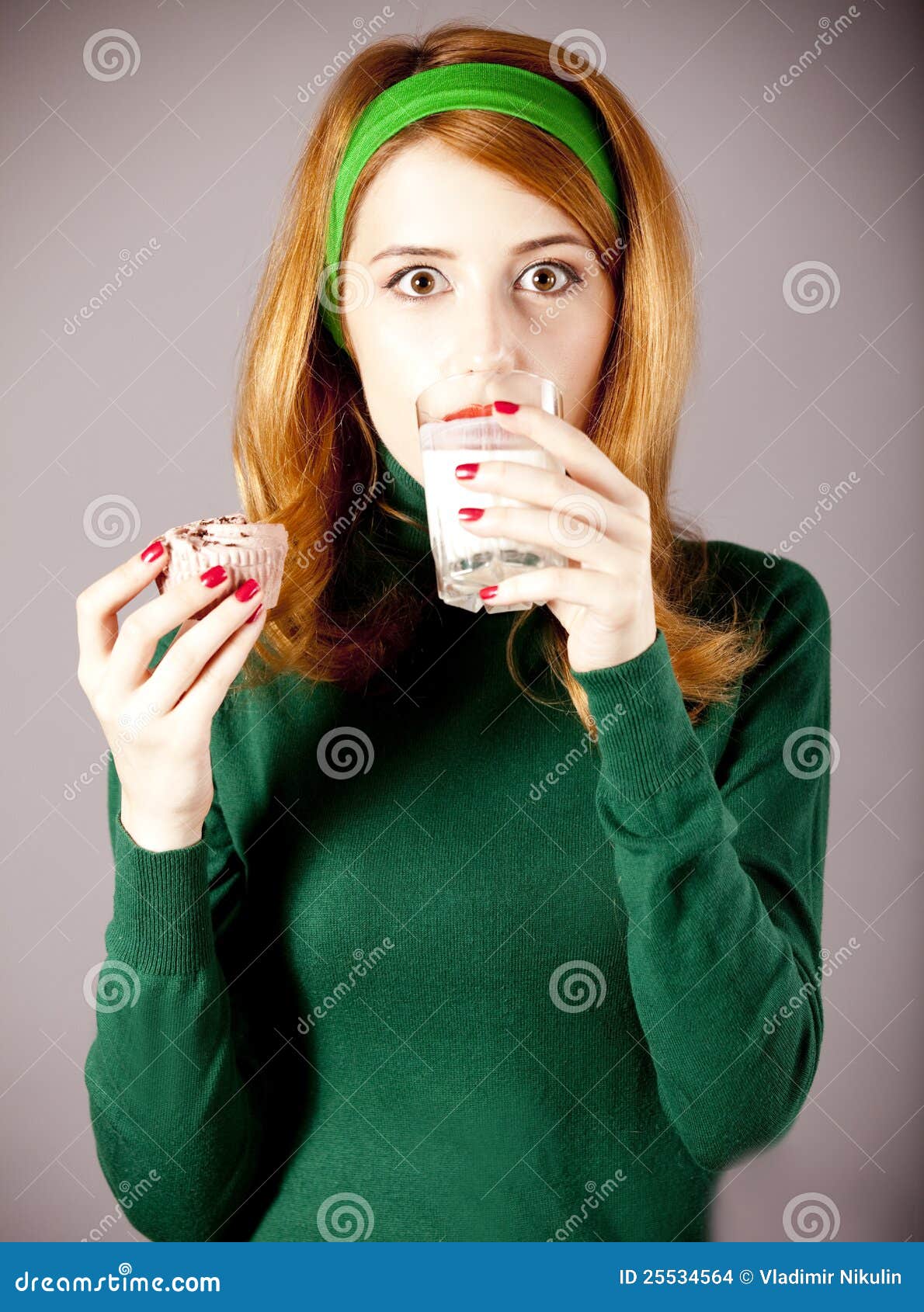 American Redhead Girl with Milk and Cake. Stock Photo Image of