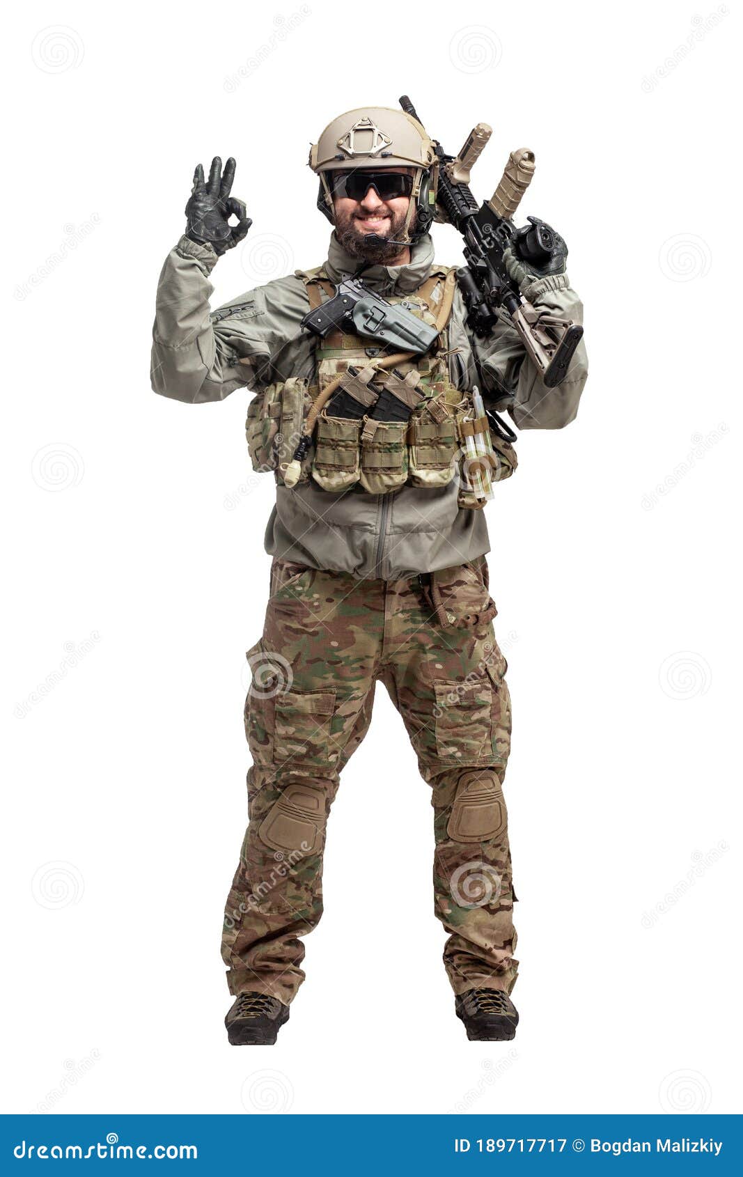 American Soldier In Military Equipment With A Rifle On A White American Soldier In Military Equipment With A Rifle On A White
