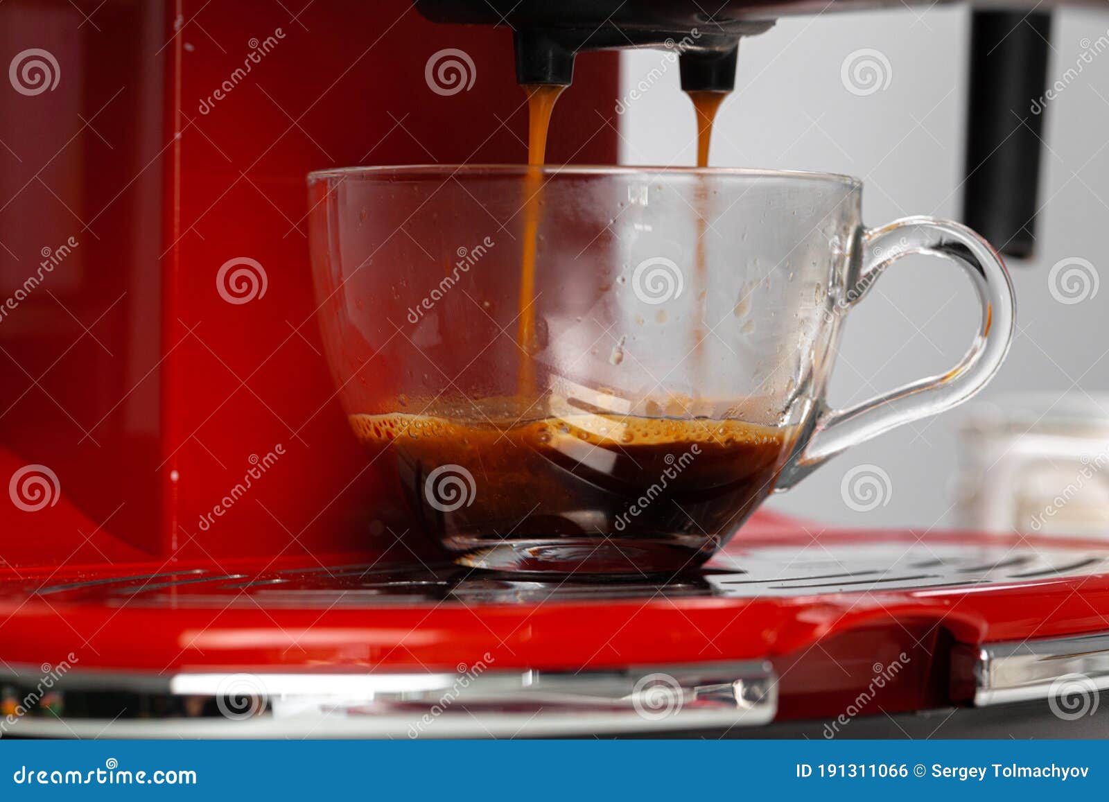 Americano Coffee Pouring from Home Coffee Machine Stock Photo Image