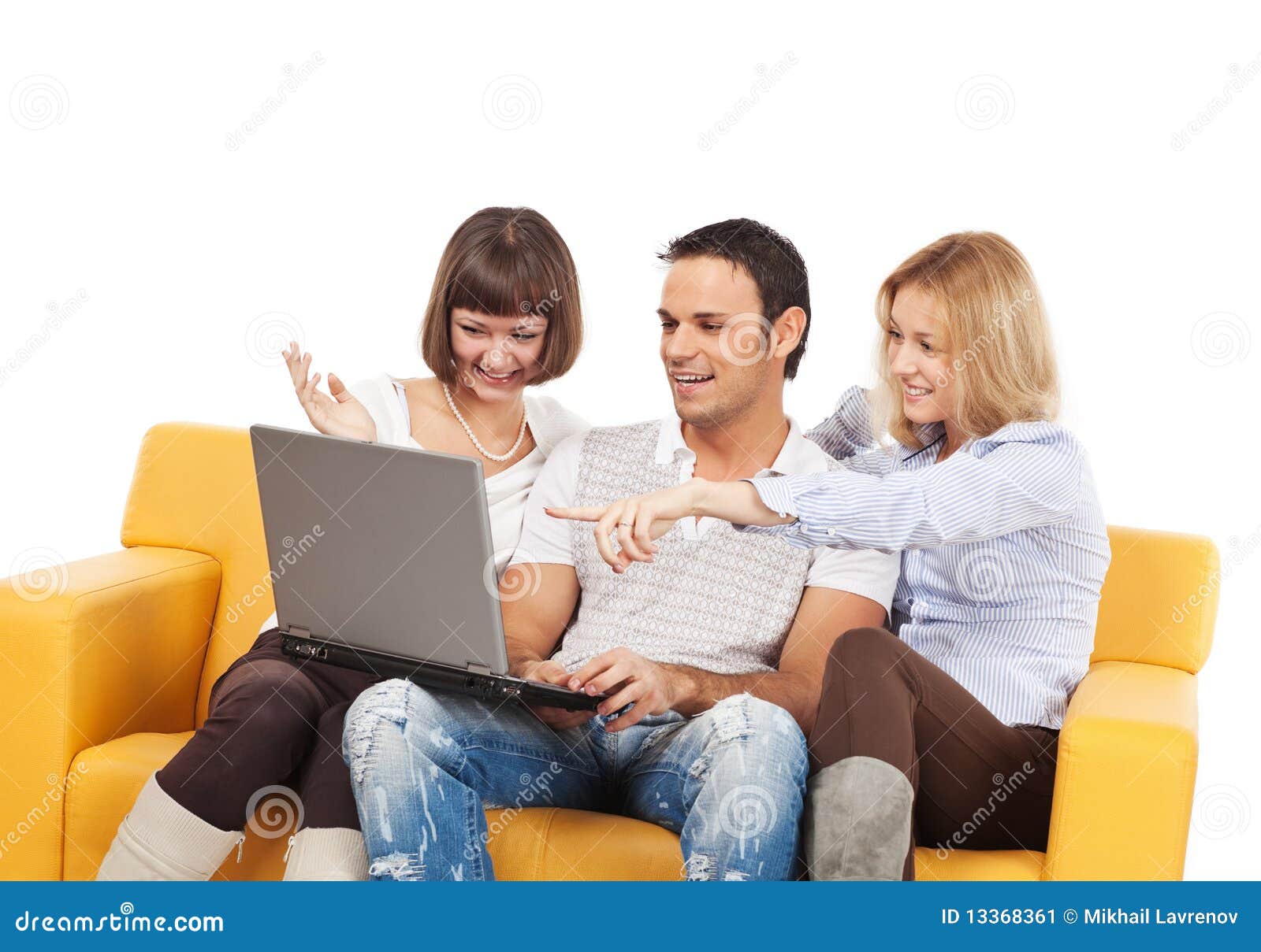 amused young people with laptop computer