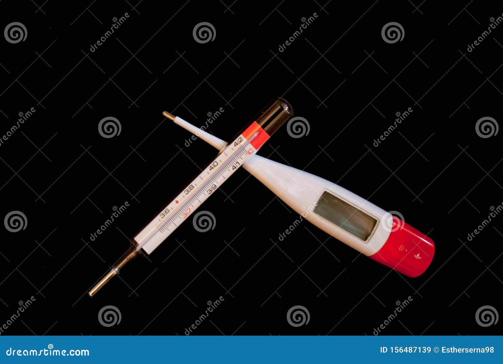 analog and digital thermometer on black background