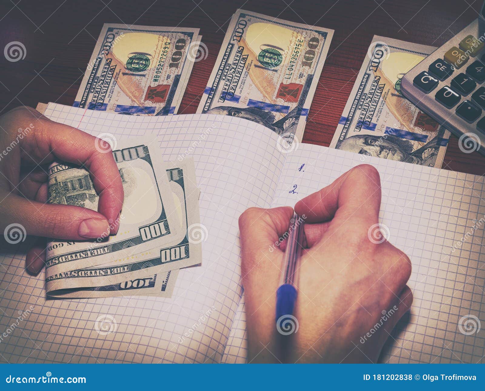 Analysis and Budgeting Using a Calculator. Recording Planning in a Notebook Stock Photo Image