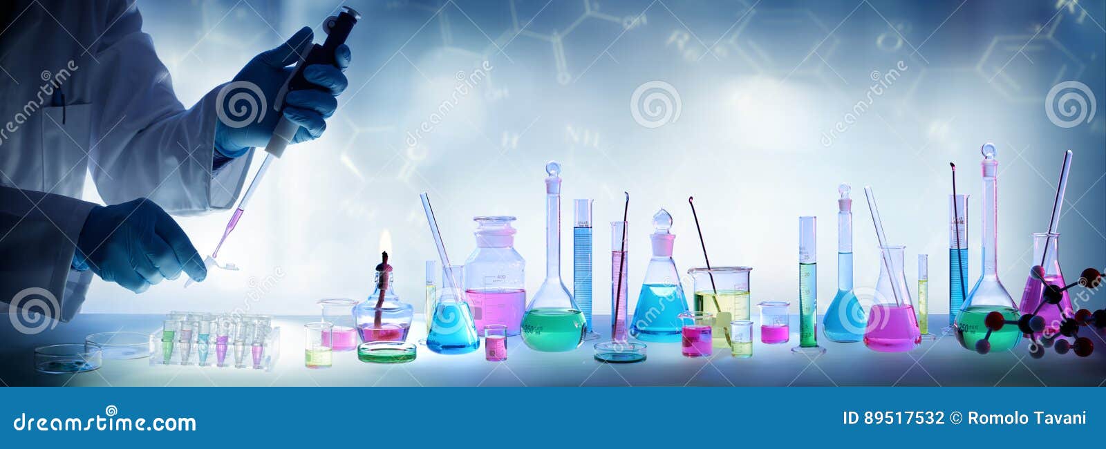 analysis laboratory - scientist with pipette and beaker