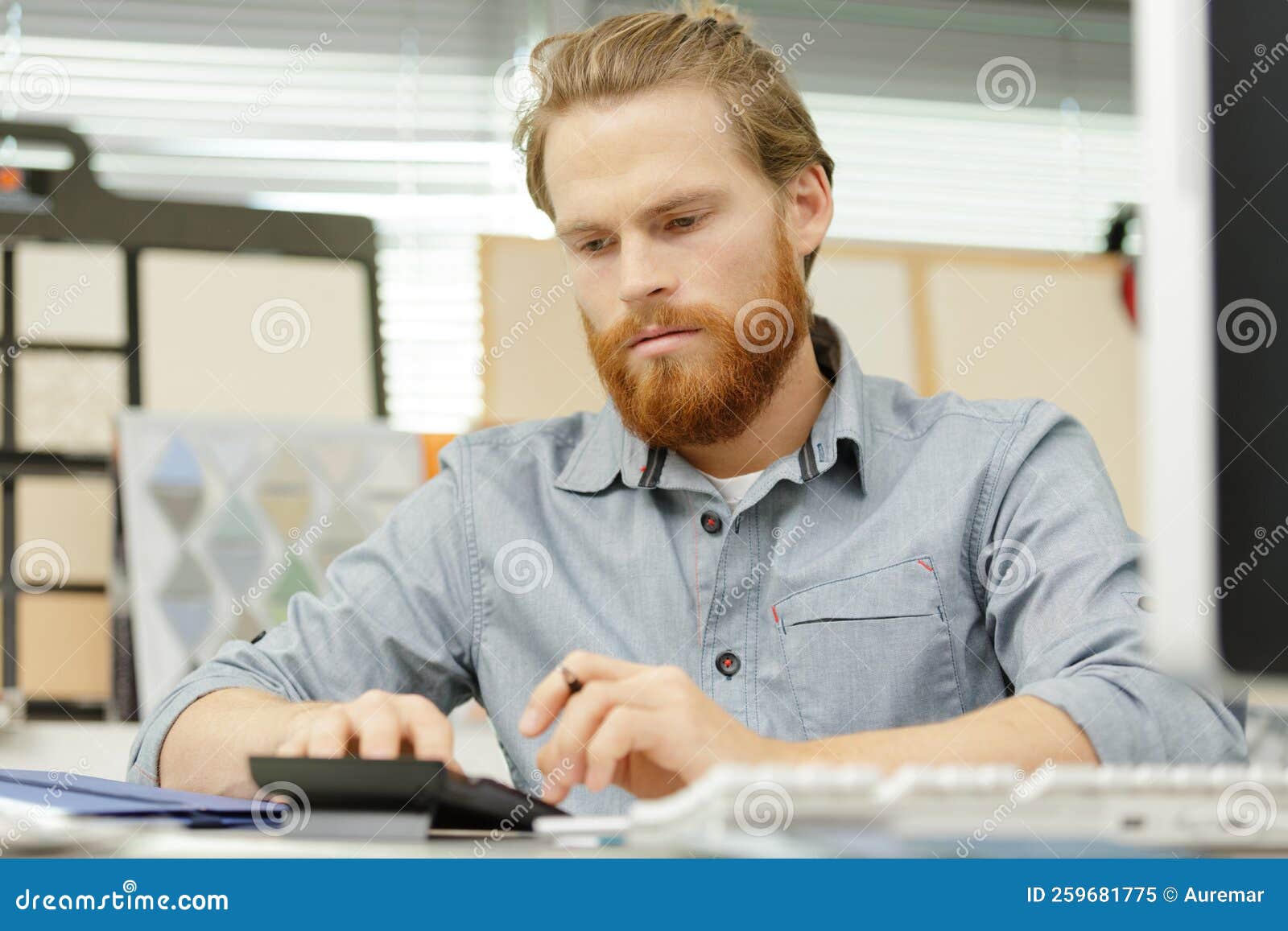 Analyze Business Data Data with Business Men Using Office Calculators