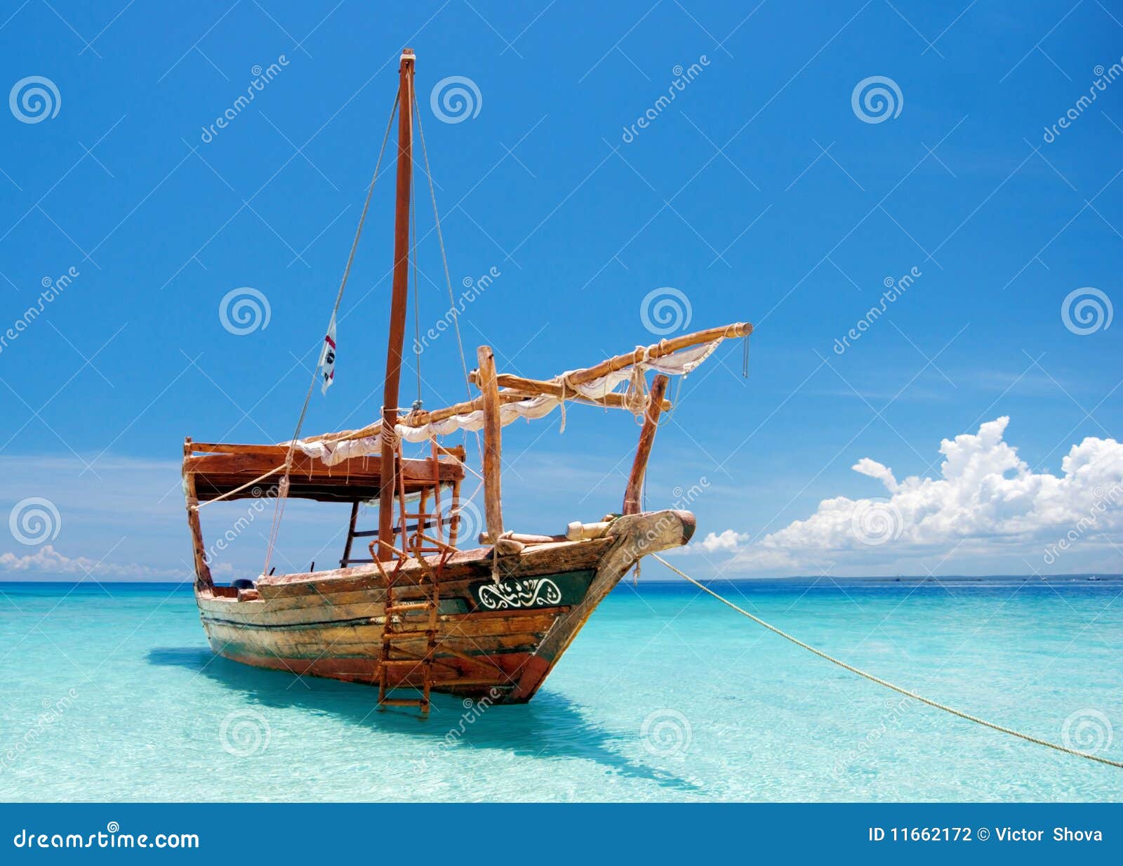 Anchored wooden dhow boat stock photo. Image of sand 11662172