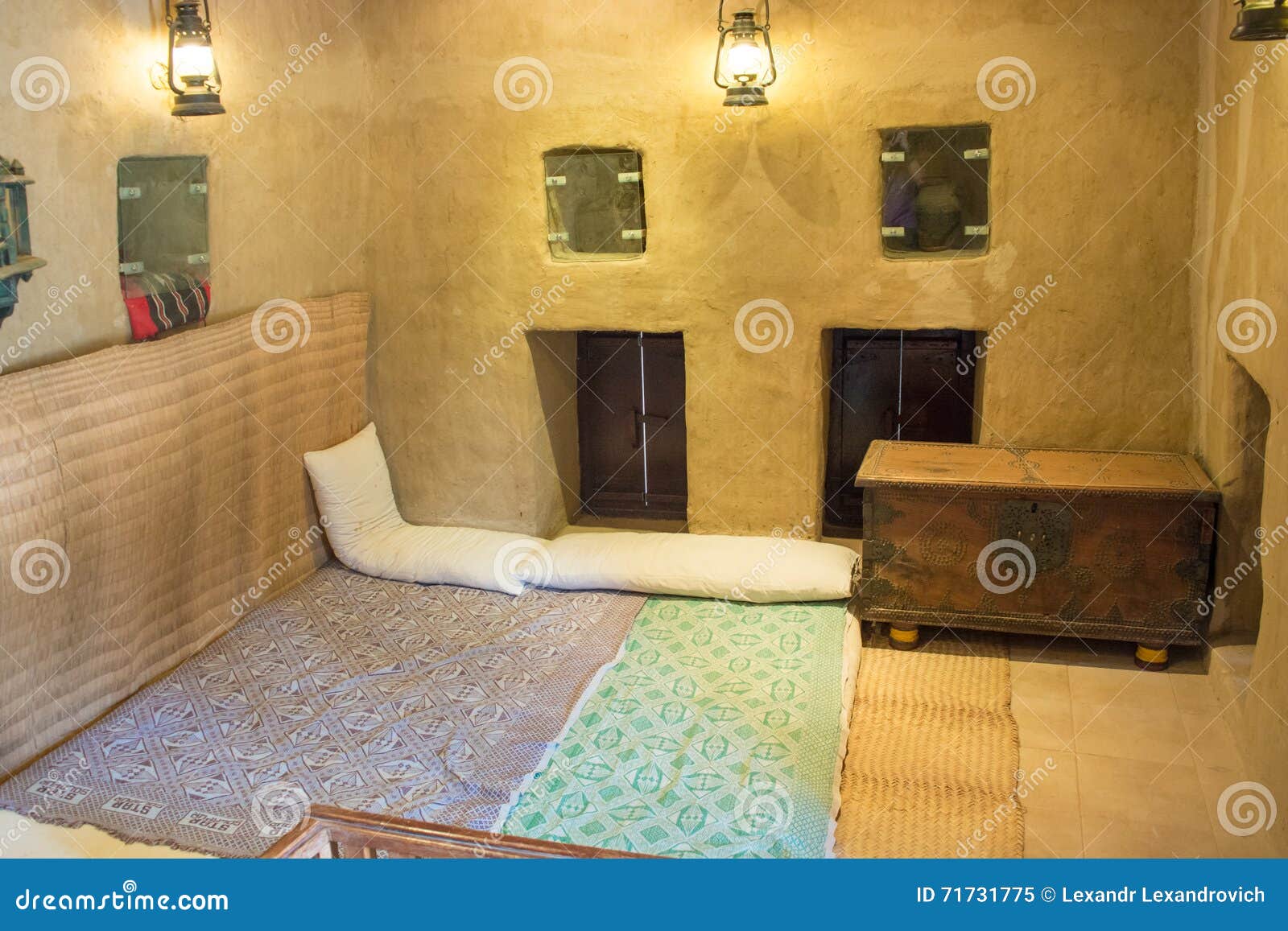 Ancient Arabian Bedroom with Pillows, Carpet and Chest Stock Image