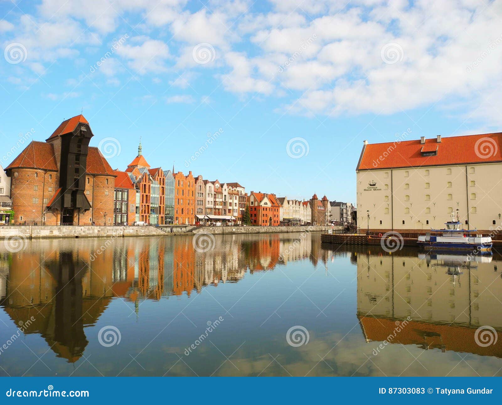 Ancient architecture of Gdansk. Gdansk, Poland - 8 May, 2015: Landscape architecture and river bank view of ancient port of Motlava at Gdansk city promenade riverside.