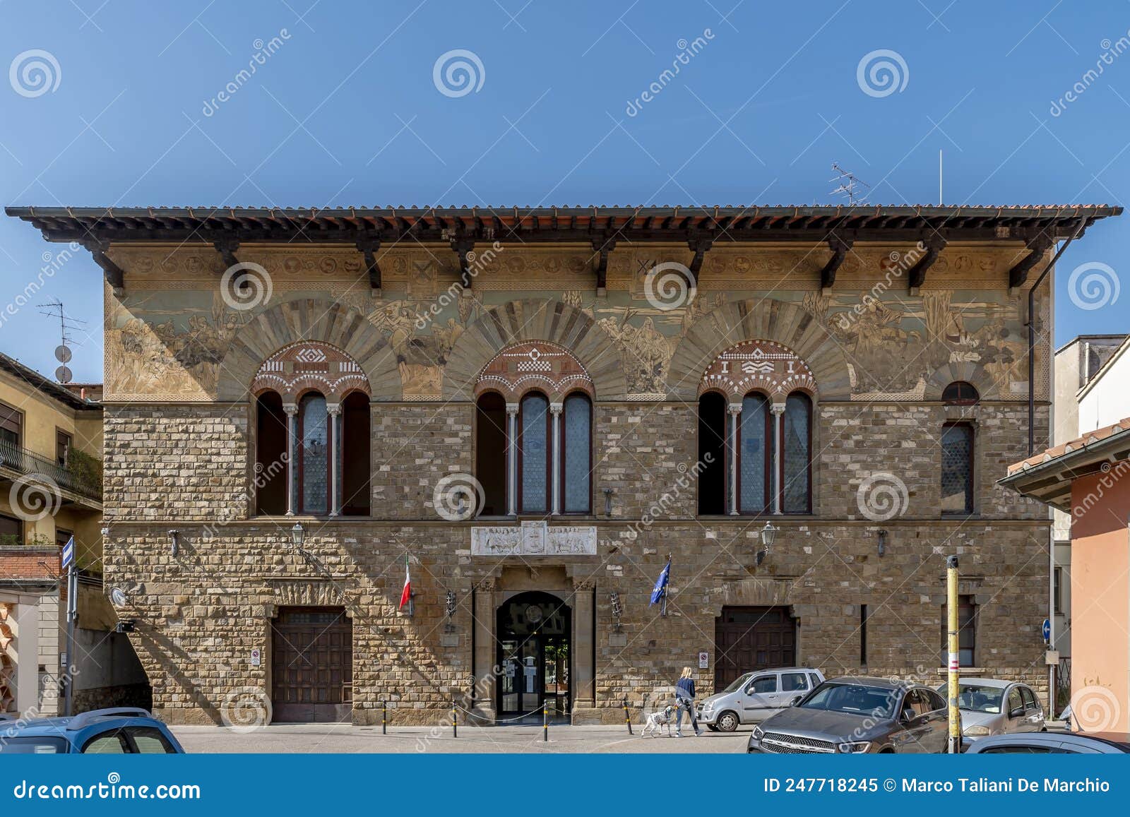 the ancient building of the public assistance l`avvenire in the historical center of prato, italy
