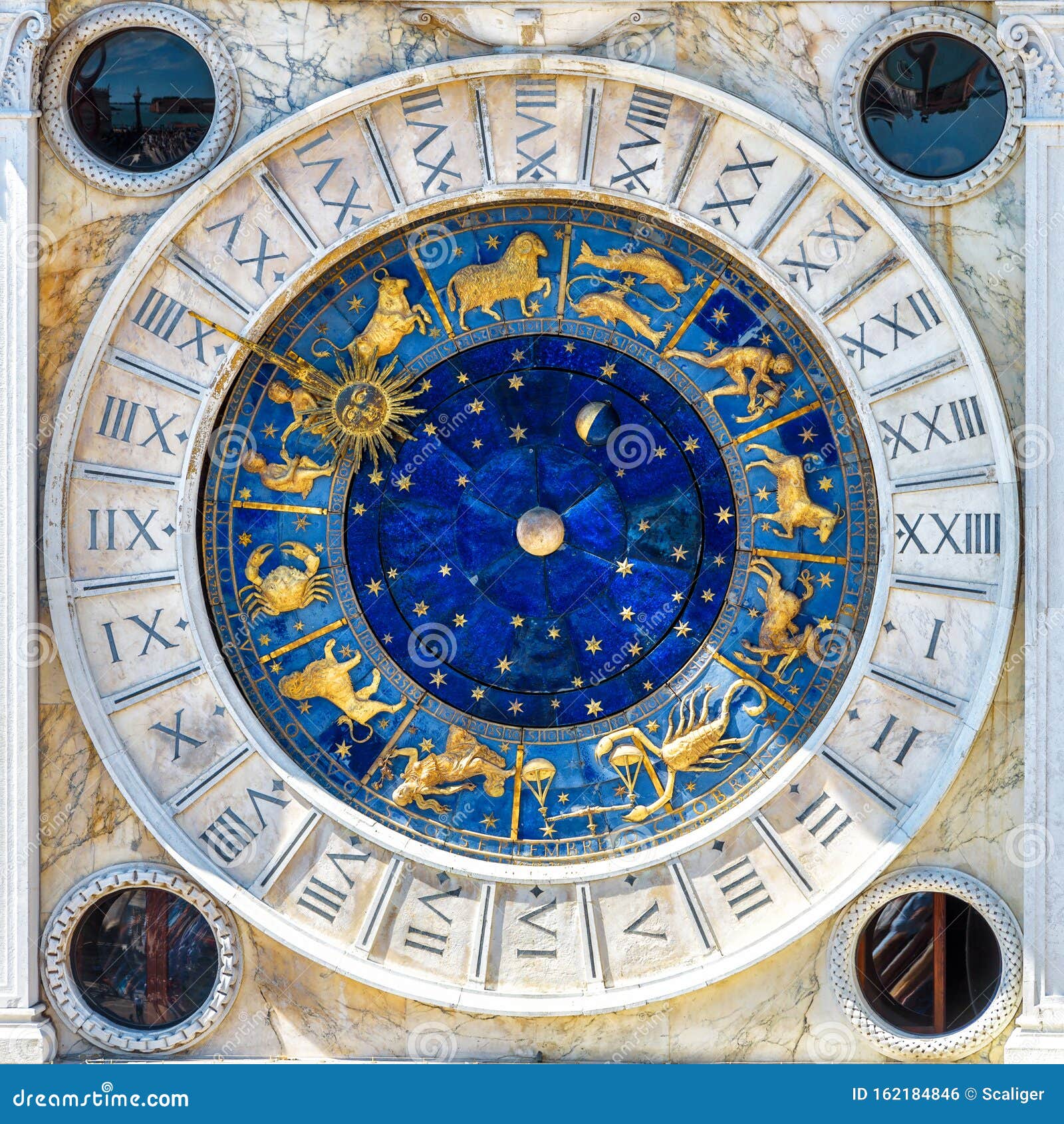 ancient clock torre dell`orologio with zodiac signs, venice, italy. it is old landmark of venice