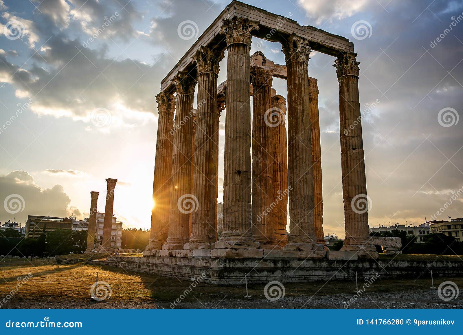 the ancient greek columns of ancient temple of zeus, olympeion, athens, sunset light,