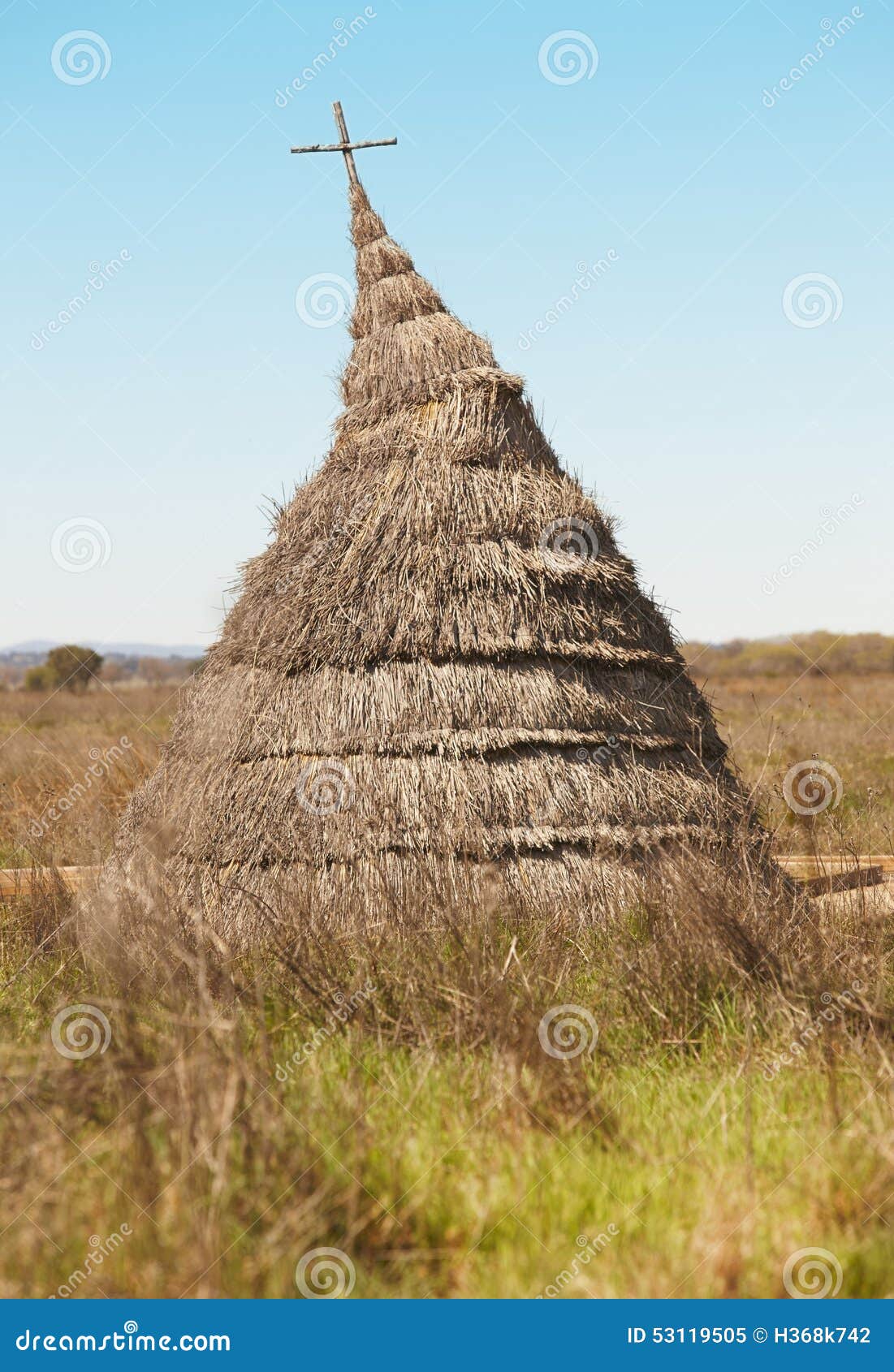 ancient hut in a mediterranean meadow landscape. cabaneros, spai