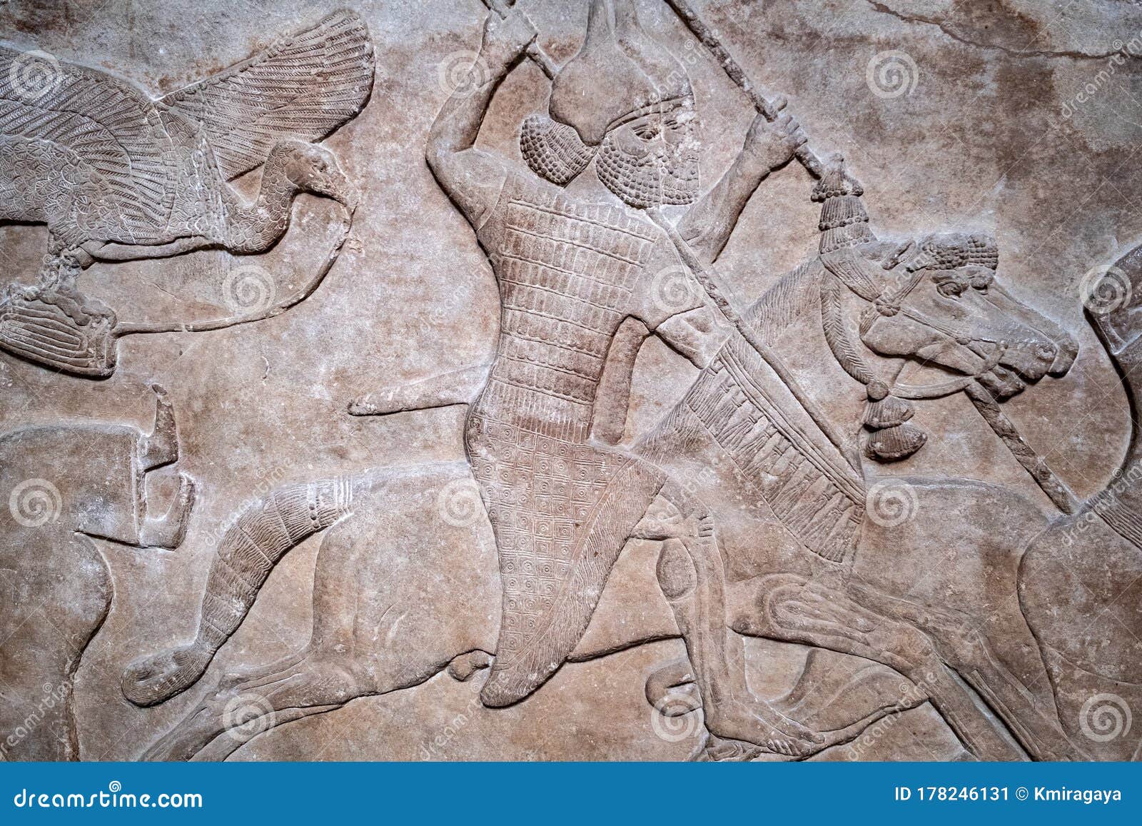 ancient persian bas-relief depicting warriors on horseback