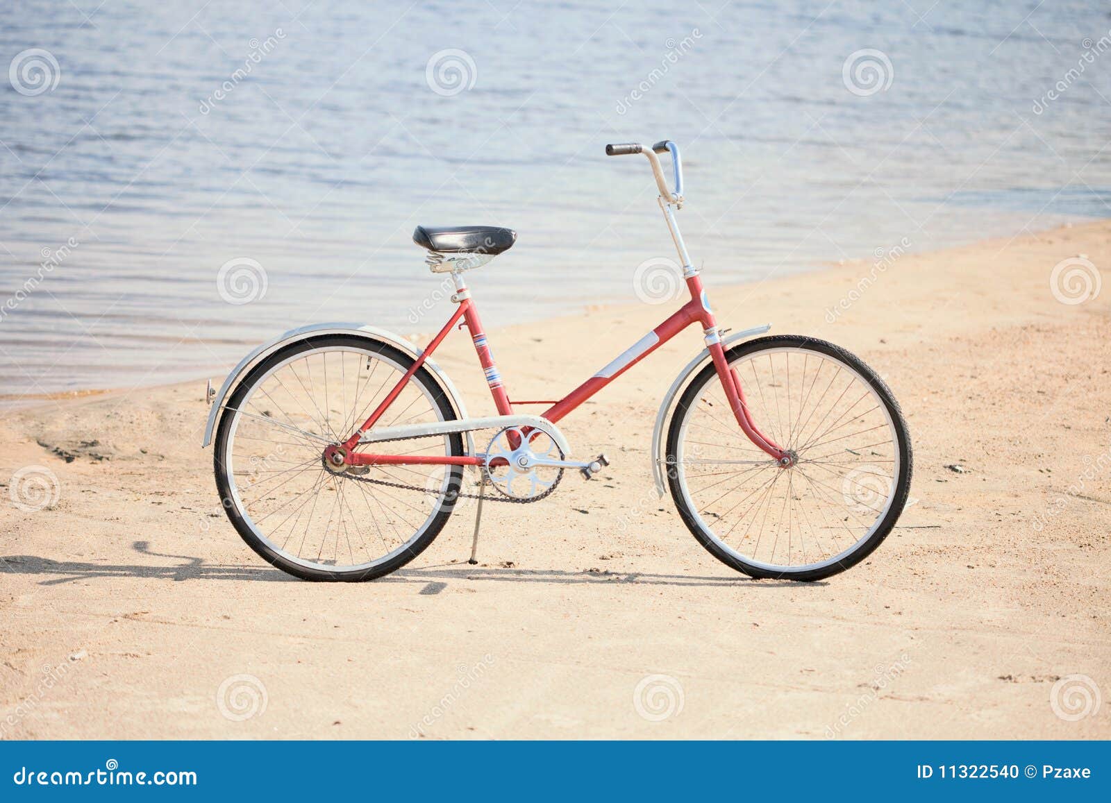 Ancient red bicycle stock photo. Image of beach, ground - 11322540