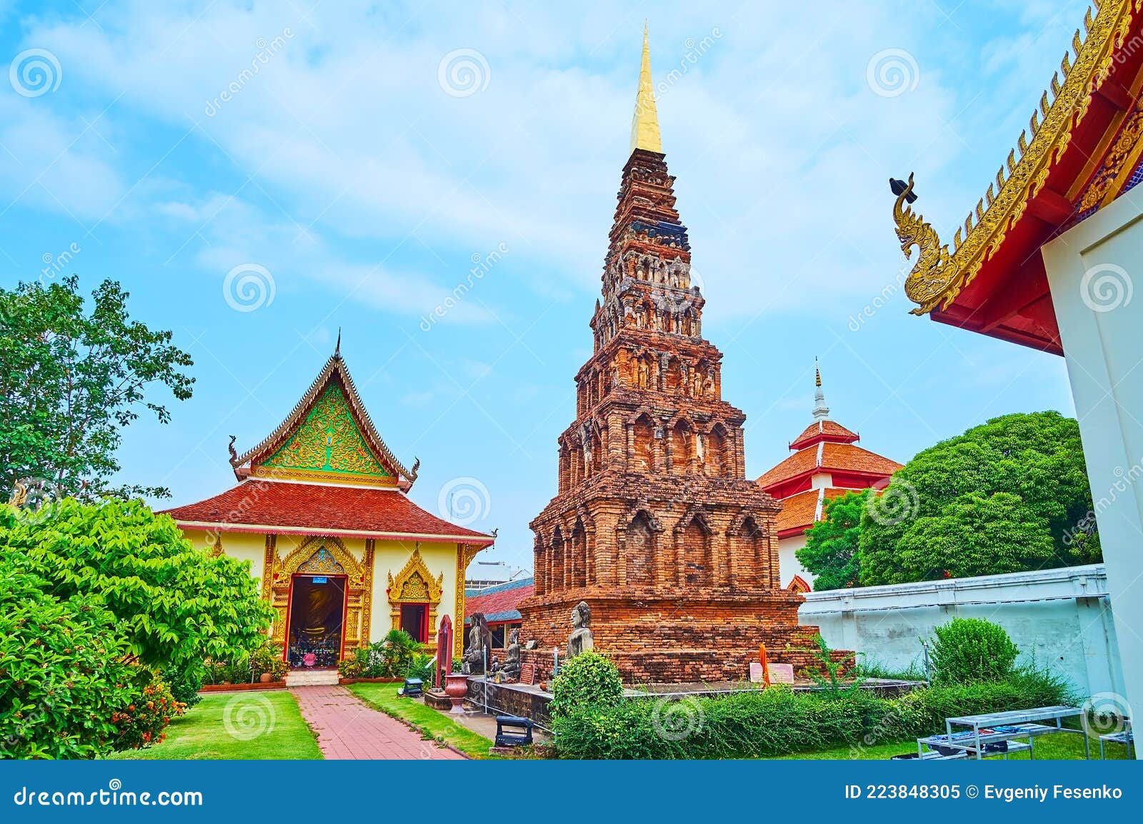 the ancient suwanna chedi and viharn phra chao daeng in wat phra that hariphunchai temple, lamphun, thailand