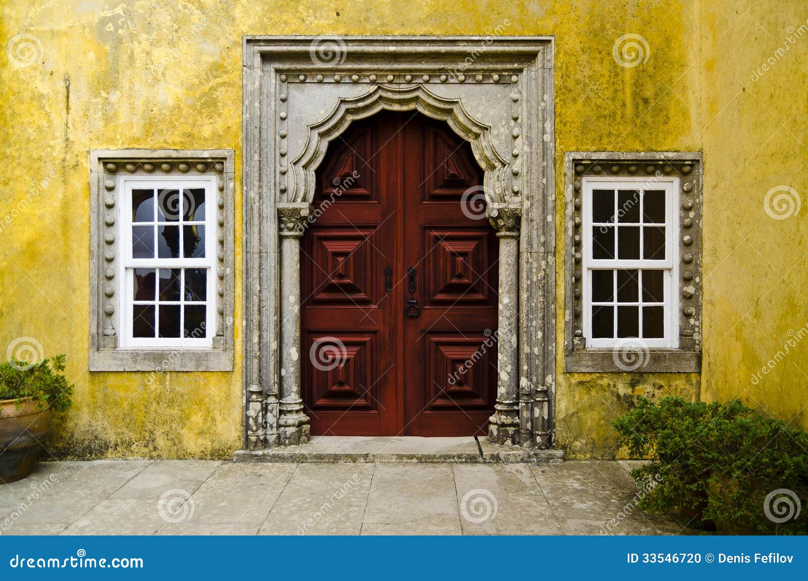 ancient red door in quinta da regaleira, sintra, portugal