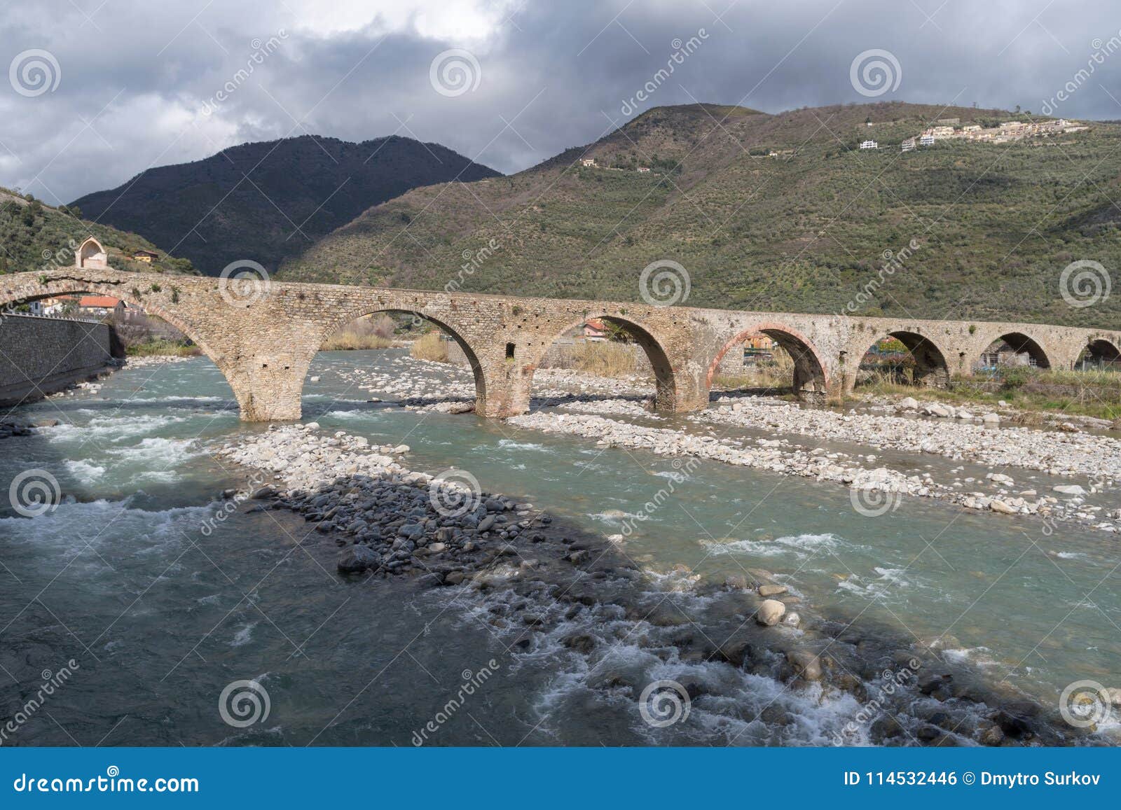 roman stone bridge, taggia, liguria, italy