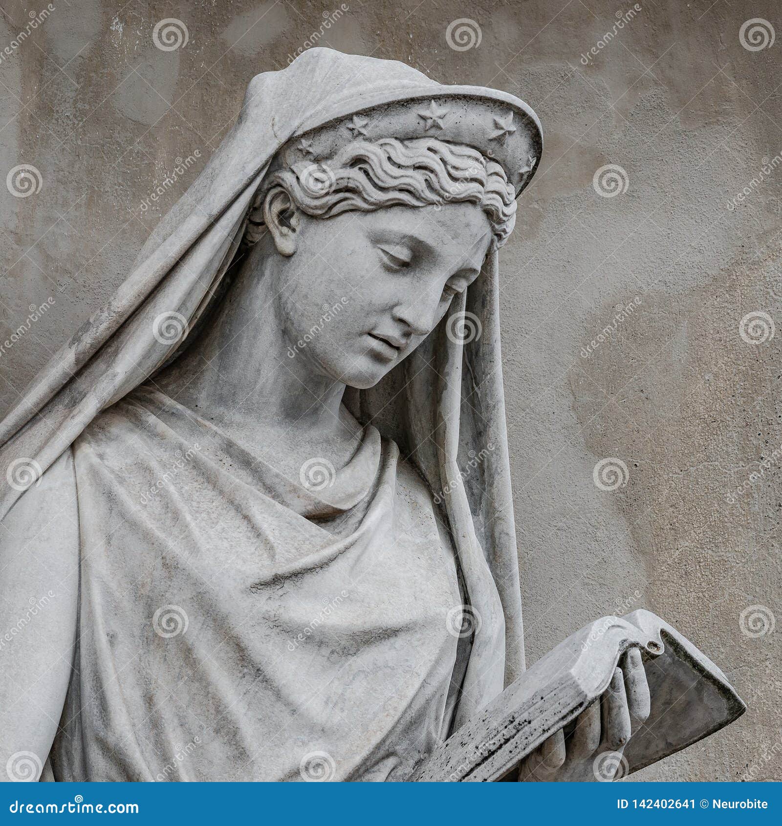 ancient statue of sensual italian renaissance era woman reading a book, potsdam, germany, details, closeup