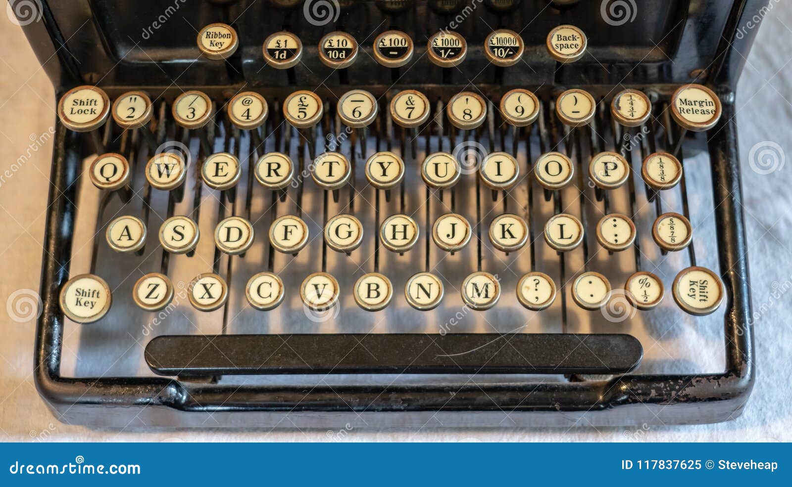 ancient vintage portable typewriter with qwerty keyboard
