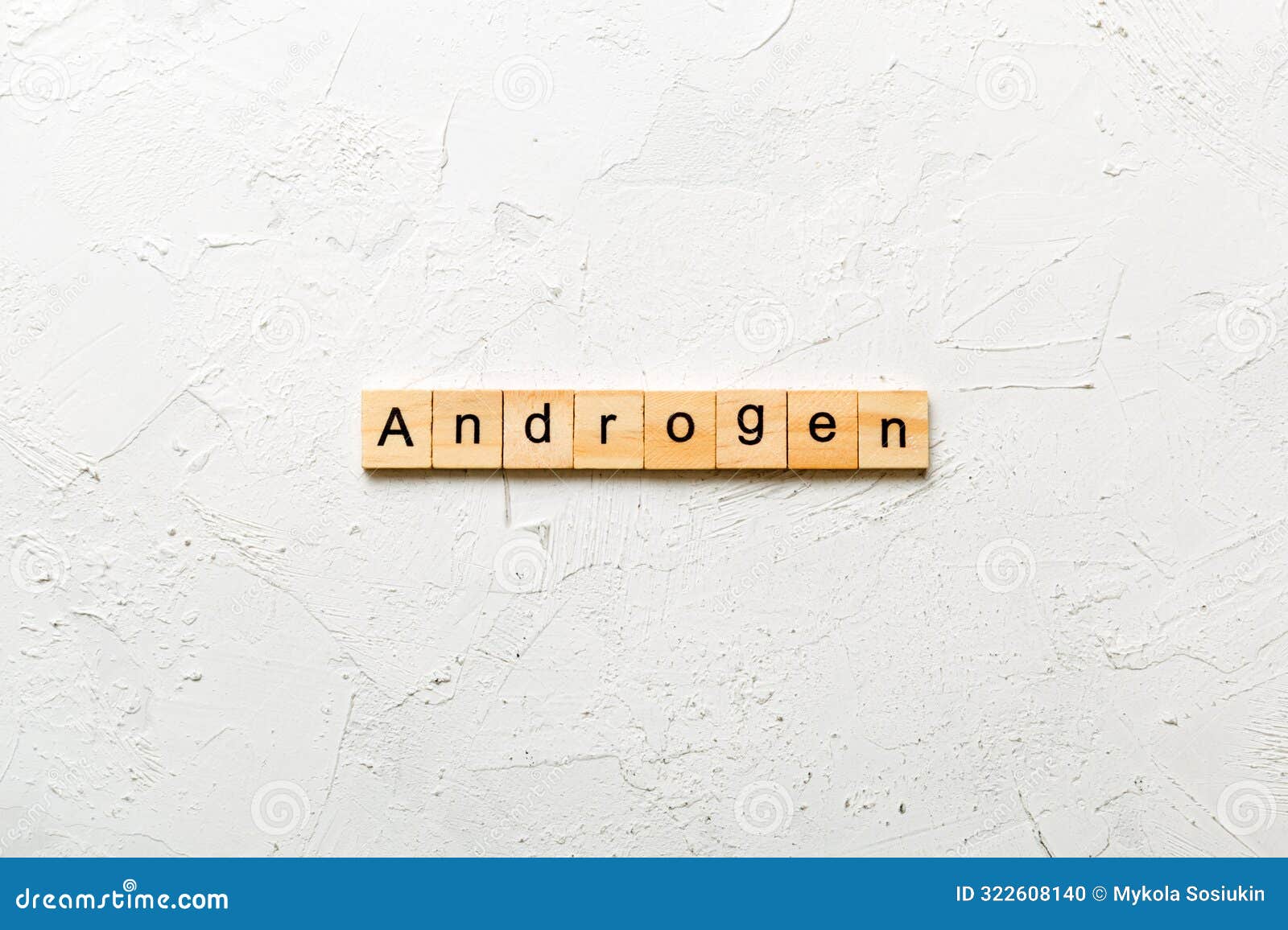 androgen word written on wood block. androgen text on table, concept