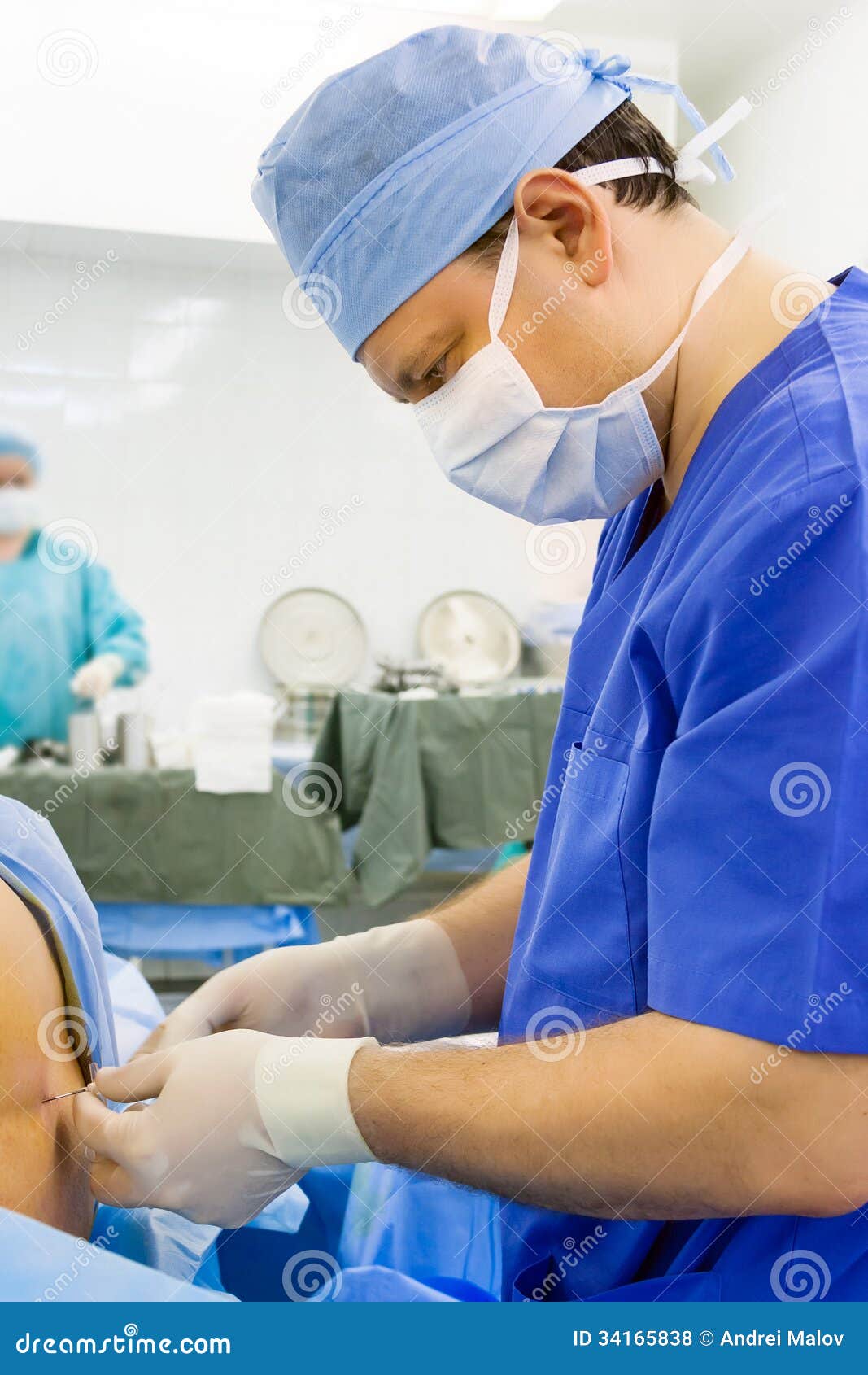 Anesthesiologist Performing Epidural Anesthesia Stock Photo Image of instrument, injecting