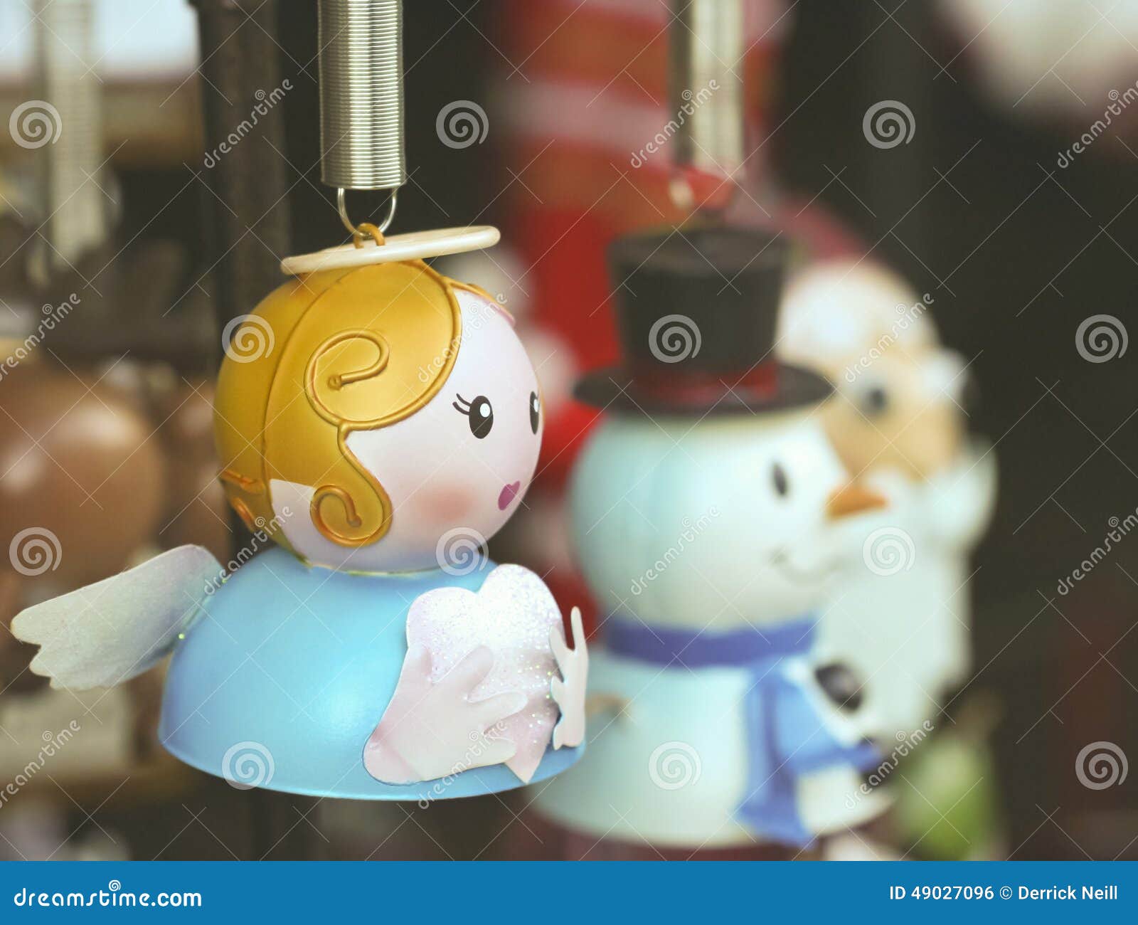 An Angel Christmas Ornament With Frosty And Santa Stock Photo Image