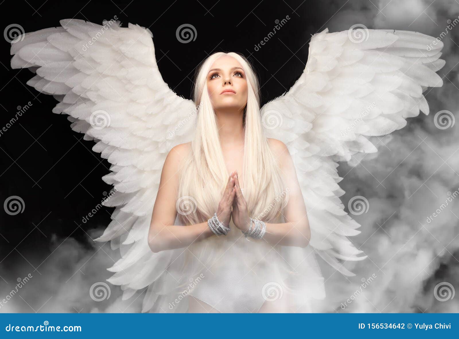 Angel Girl with White Hair on Black Background, Hands Folded in Prayer  Stock Photo - Image of girl, happy: 156534642