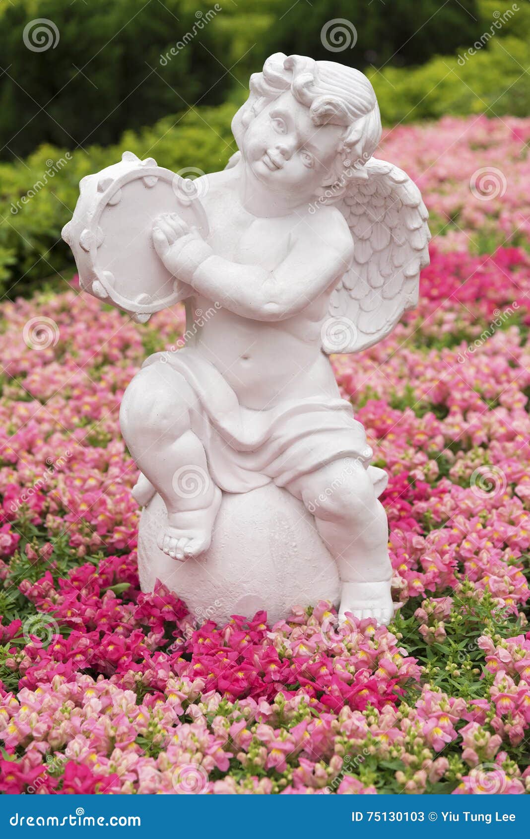 Angel sculpture in garden stock image. Image of garden 75130103