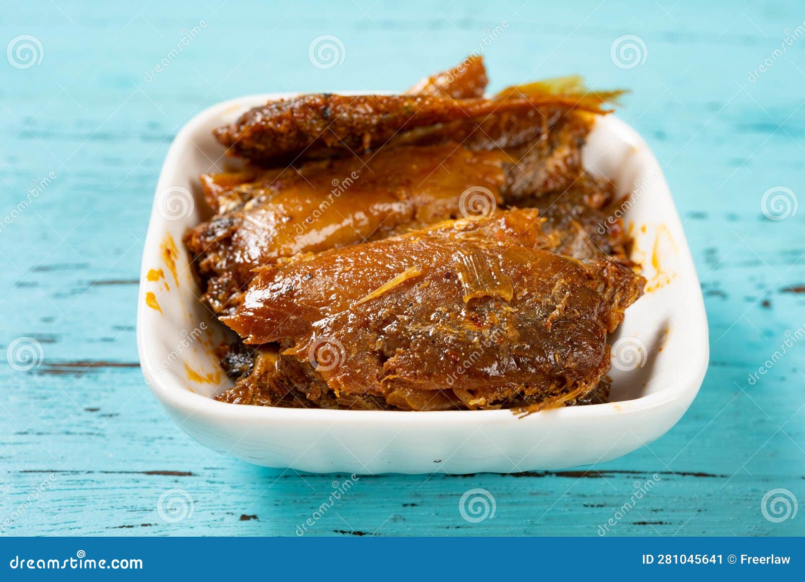 Dish of dried fish snack stock image. Image of wooden 281045641