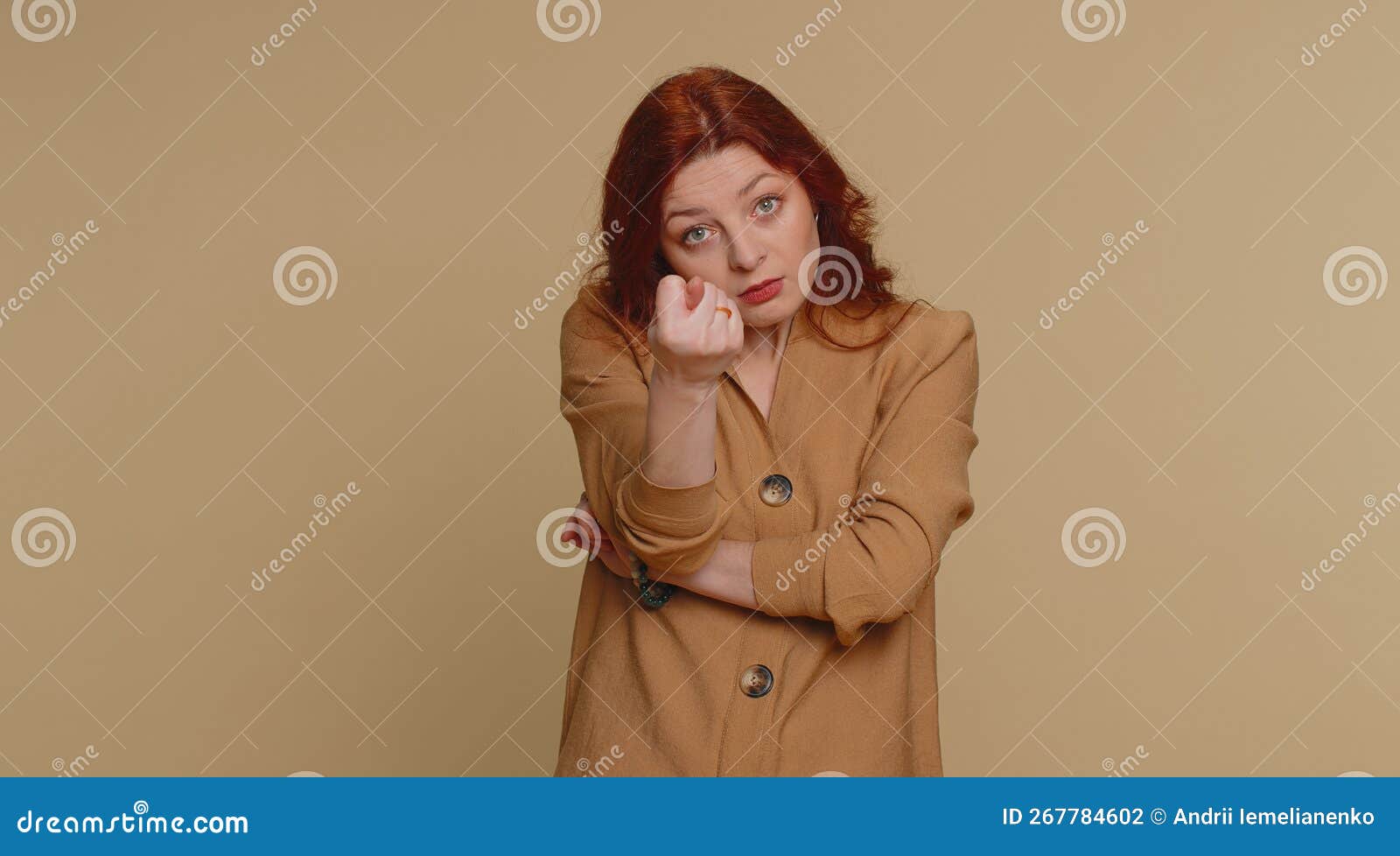 angry aggressive woman showing fig negative gesture, you dont get it anyway, rapacious, avaricious