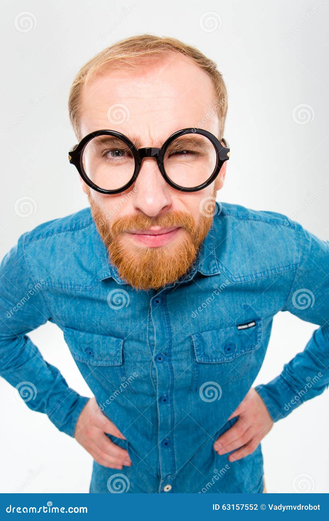 Angry Amusing Young Man With Beard In Funny Round Glasses Stock Photo