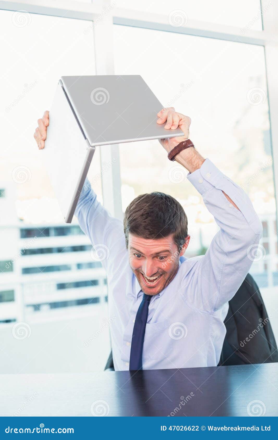 Angry Businessman Throwing His Laptop Stock Photo Image of office
