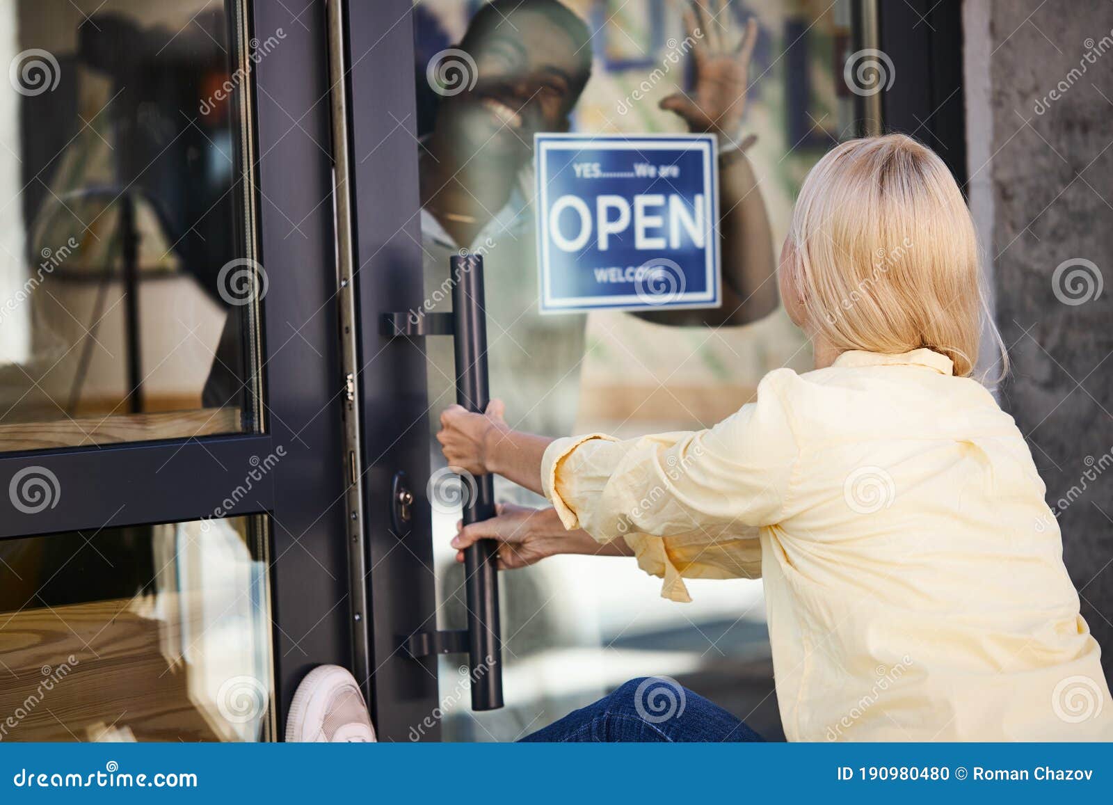 Angry Caucasian Woman Opens the Door with Her Foot Stock Photo - Image ...