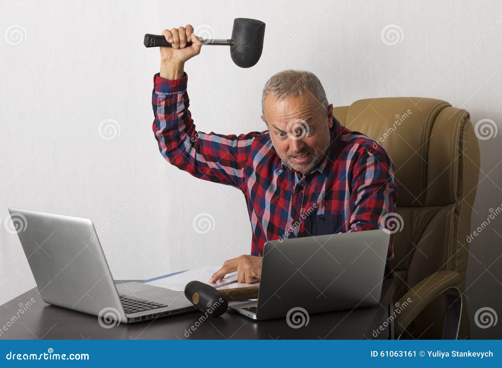 Angry man crashing laptop stock image. Image of frustrated 61063161