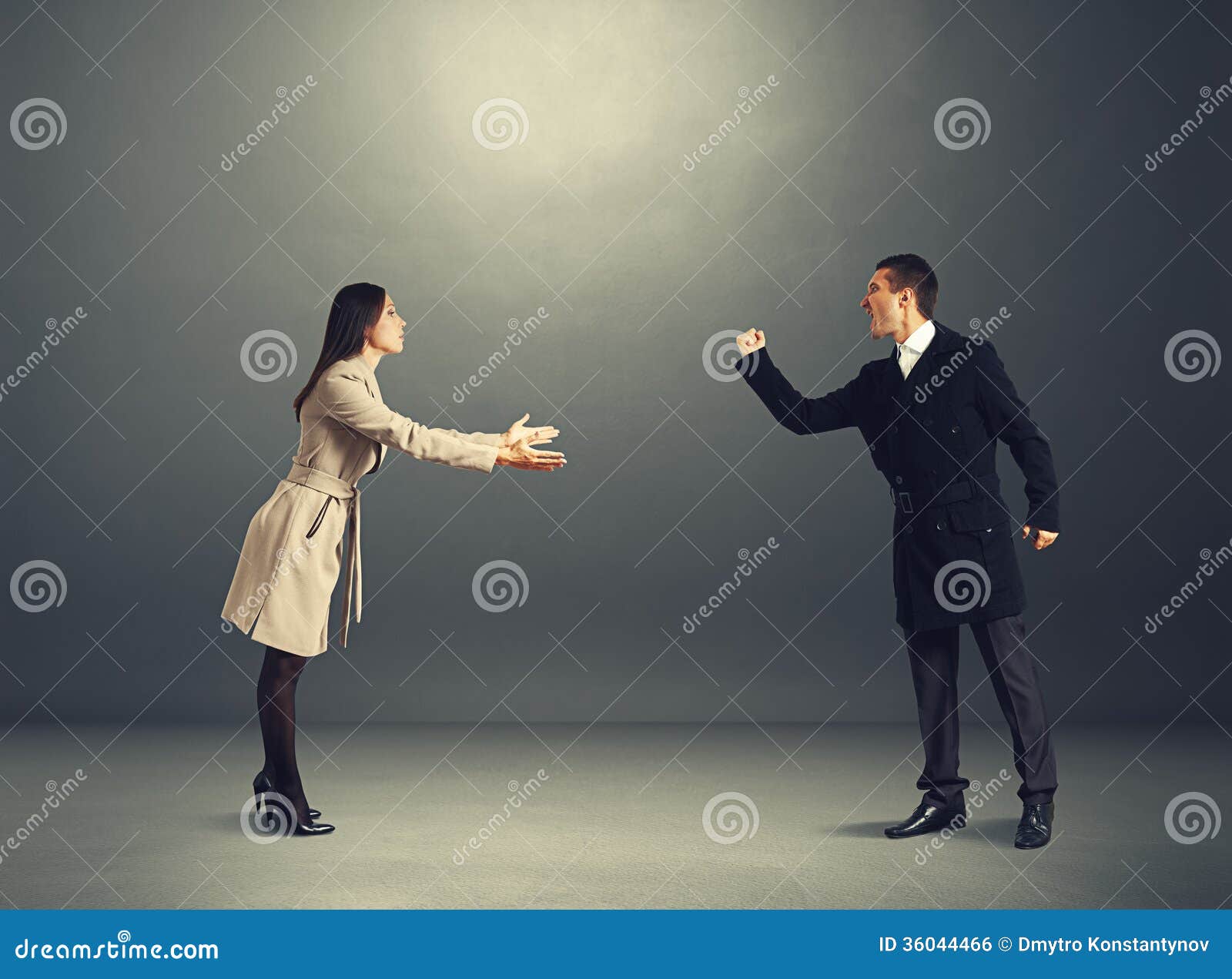 angry man at odds with young woman