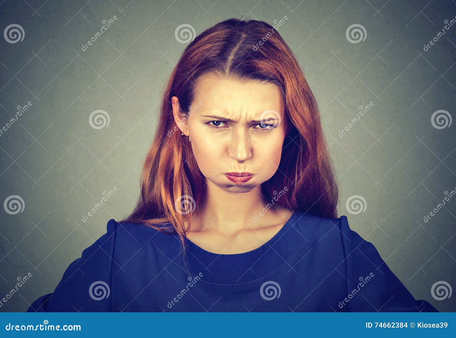 Angry Woman Puffing Out Cheeks About To Have Nervous Breakdown Stock
