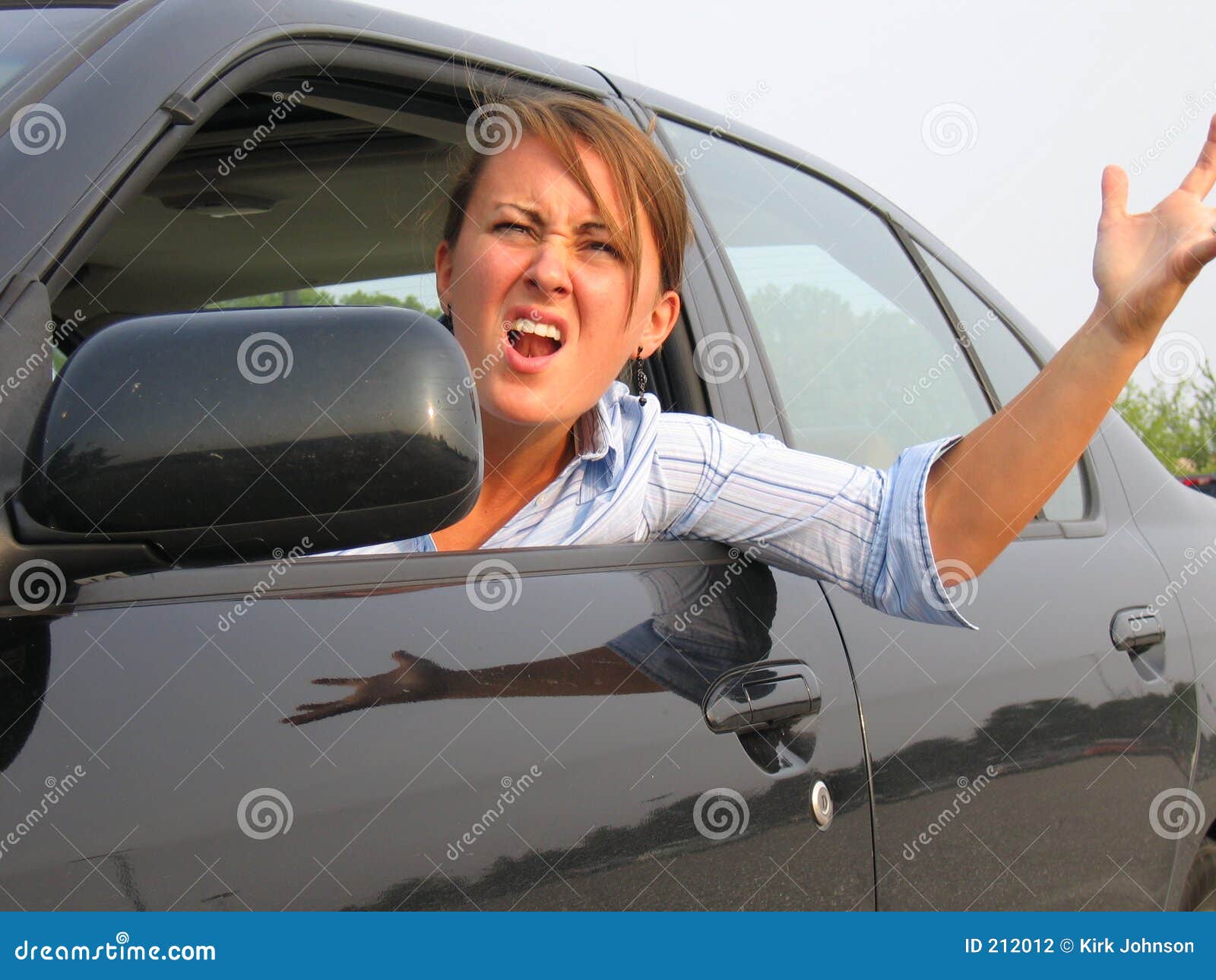angry woman yelling out car window