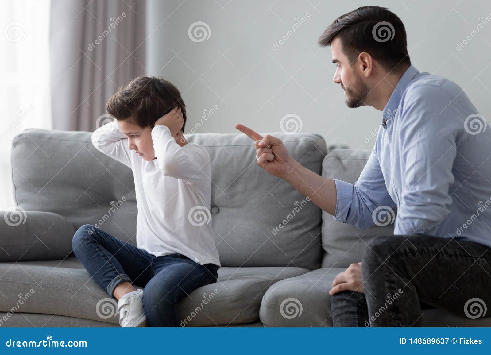 Angry Dad Scolding Preschooler Son Having Dispute at Home Stock Image
